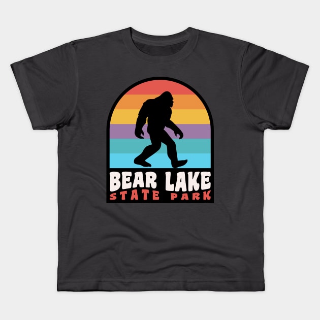 Bear Lake Utah Bigfoot Sasquatch Retro Sunset Kids T-Shirt by PodDesignShop